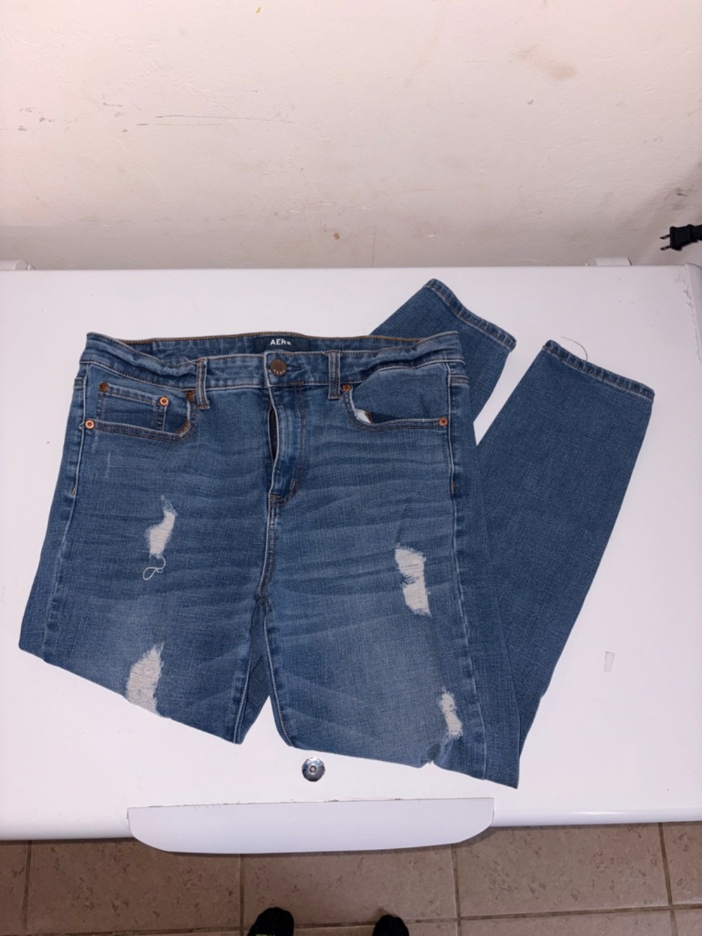 AERO High Rise Jegging Distressed Jeans
